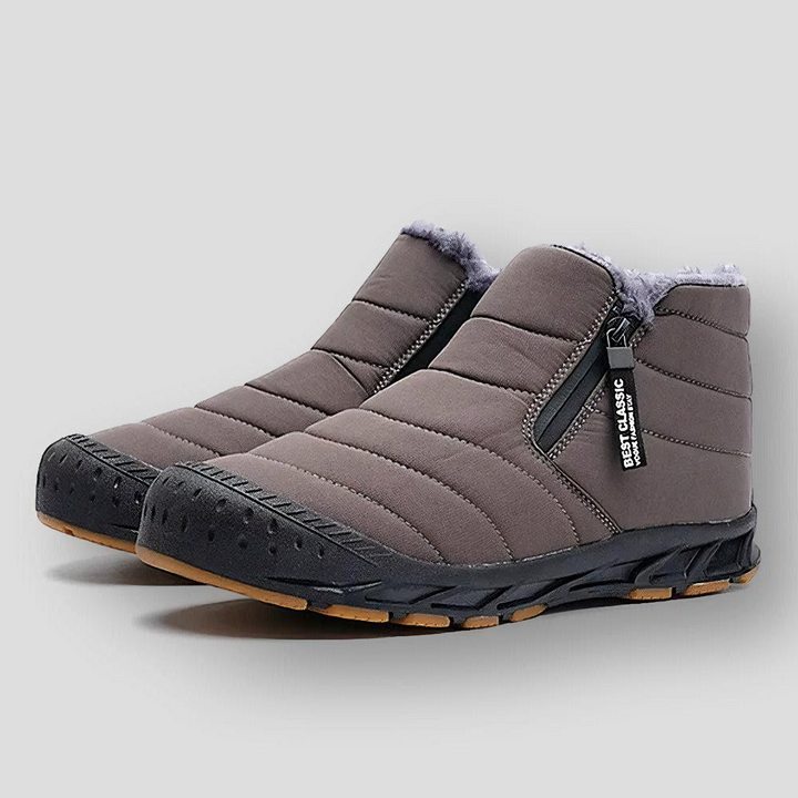 Conrad - Varm, sklisikker ankelstøvel med glidelås og pels