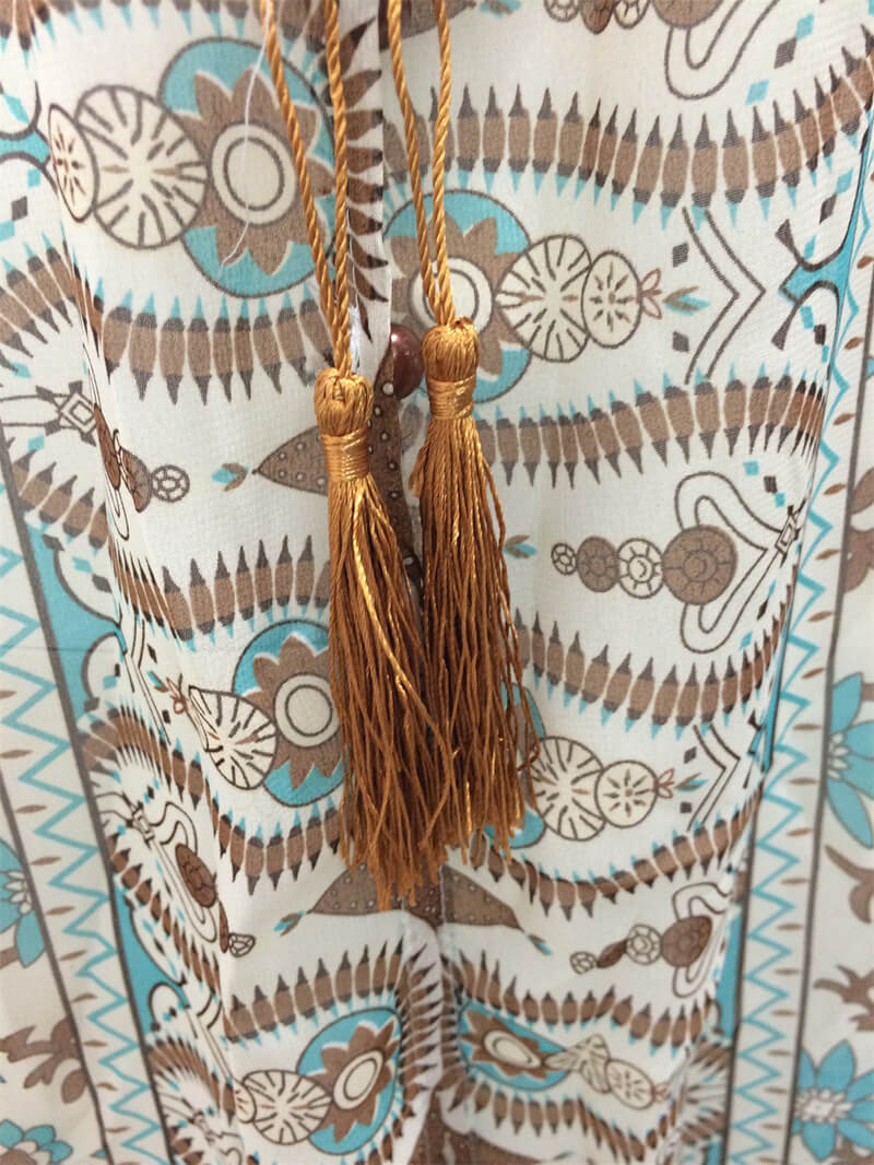 Isabella - Flytende maxikjole med detaljert mønster og rynket midje