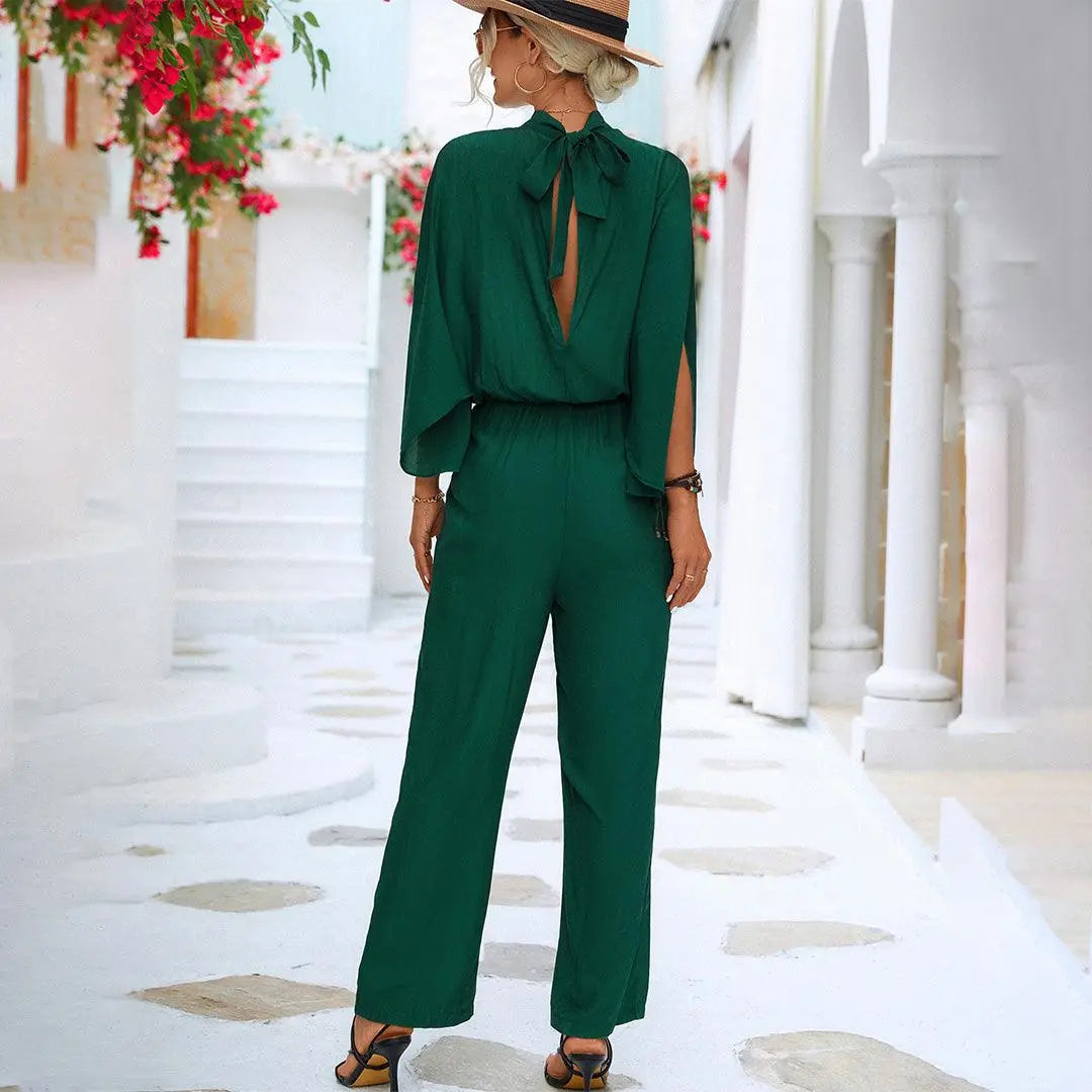 Stella - Jumpsuit med ermer i Cape-stil med åpen ryggdesign