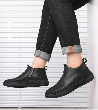 Celeste - Stilige svarte ankelstøvler med glidelåslukking og elegante perforerte detaljer