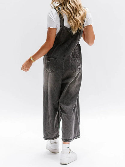 Freya - Ermeløs jumpsuit i denim med vide ben