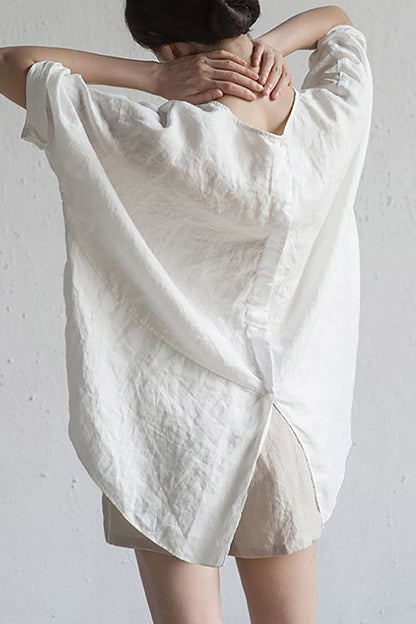 Elise – Oversized bluse med rund hals og oppbrettede ermer