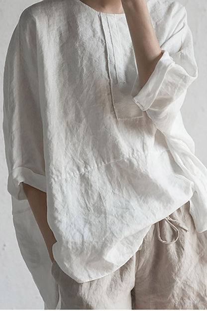 Elise – Oversized bluse med rund hals og oppbrettede ermer