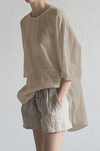 Elise – Oversized bluse med rund hals og oppbrettede ermer