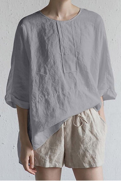 Elise – Oversized bluse med rund hals og oppbrettede ermer