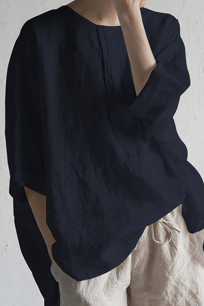 Elise – Oversized bluse med rund hals og oppbrettede ermer