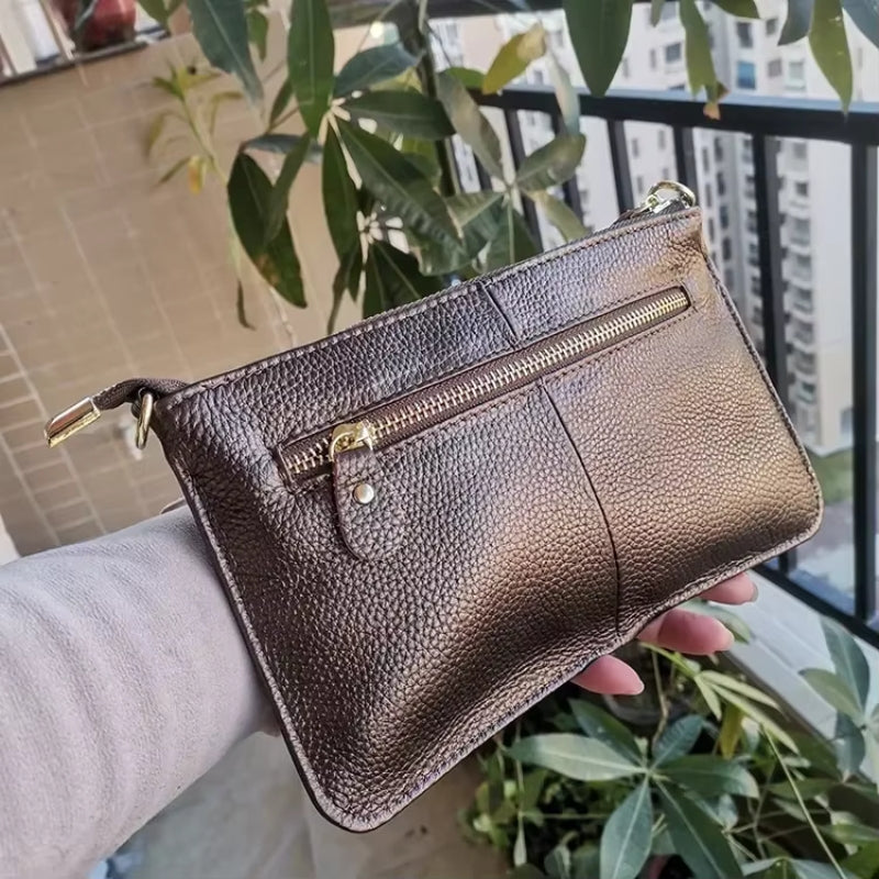 Ashley – Håndveske med spennestrå og glidelåslommer