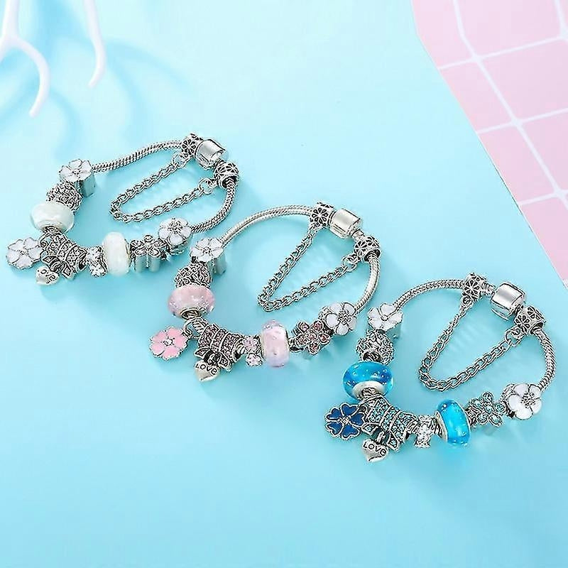 Benthe – Blomsterkjede-armbånd med Blå Krystallperler