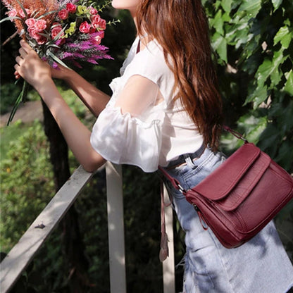 Elin – Skulderveske med justerbare stropper og glidelåslommer