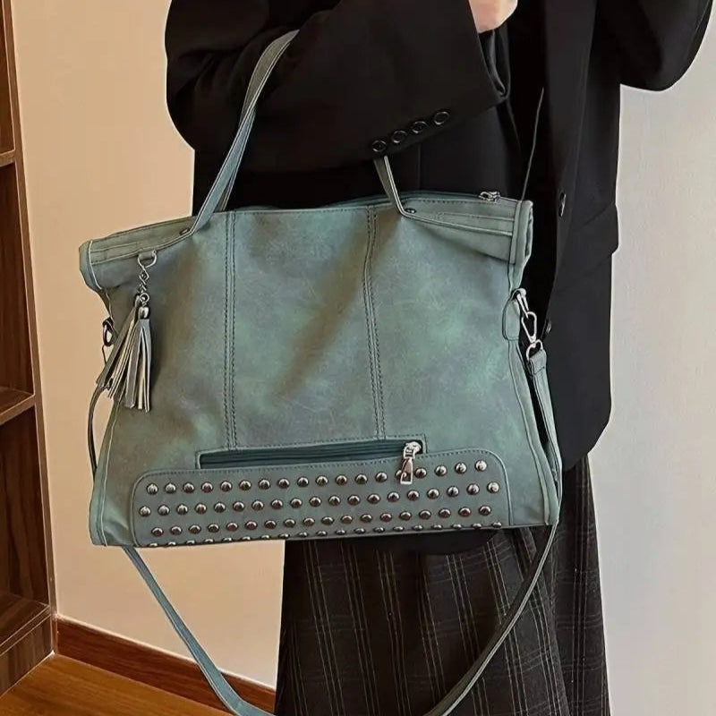 Jessica – Håndveske med flere glidelåslommer og justerbar stropp