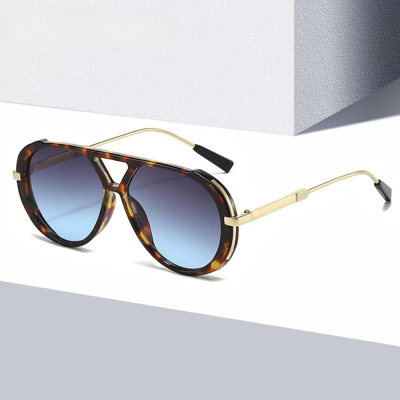 StyleHunt – Ovale Solbriller med Mønstret Ramme