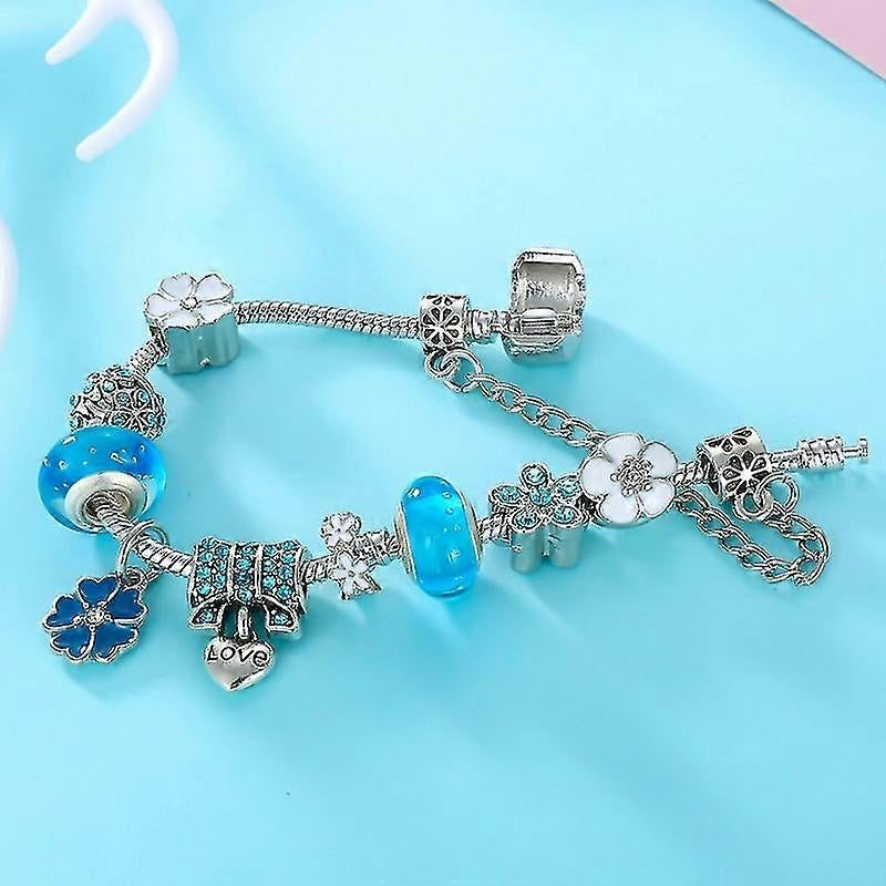 Benthe – Blomsterkjede-armbånd med Blå Krystallperler