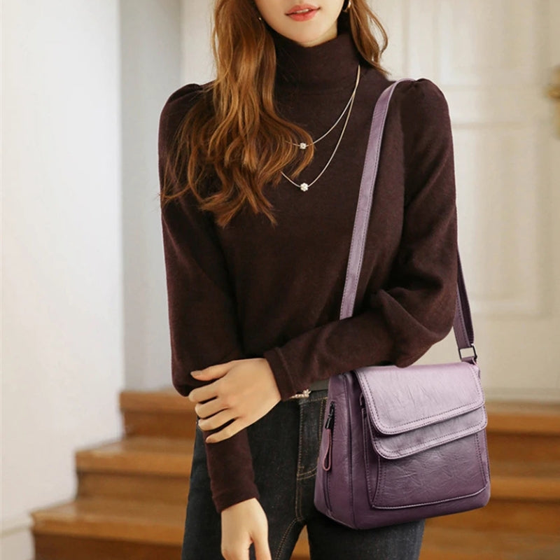 Elin – Skulderveske med justerbare stropper og glidelåslommer