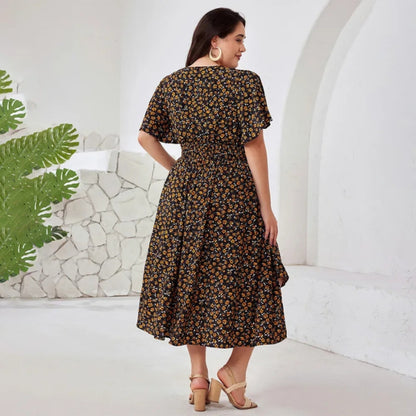 Astrid - Plus size maxikjole med blomstertrykk og lommer