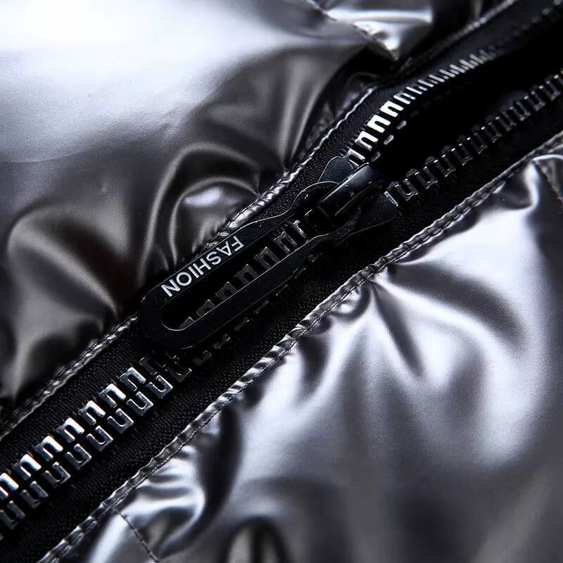 Manfred – Ermeløs polstret jakke med hette og glidelås