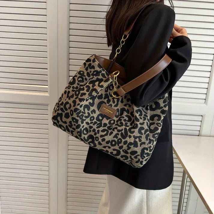 Rhea - Leopardprint håndveske med romslig interiør og dristig stil