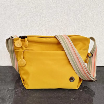 Brooklyn – Skulderveske med justerbare stropper og glidelåslommer