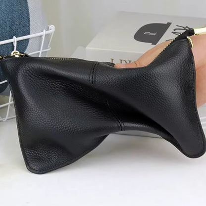 Ashley – Håndveske med spennestrå og glidelåslommer