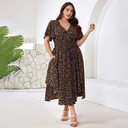 Astrid - Plus size maxikjole med blomstertrykk og lommer