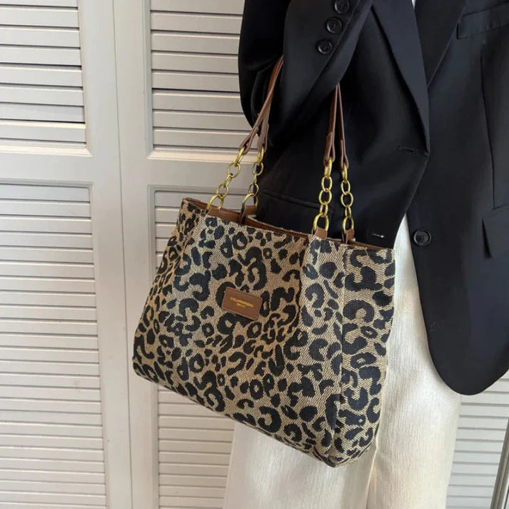 Rhea - Leopardprint håndveske med romslig interiør og dristig stil
