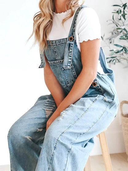 Freya - Ermeløs jumpsuit i denim med vide ben