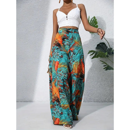 Matilda – Elegant bukse med vidde ben med høy midje og delikat blomstermønster overalt