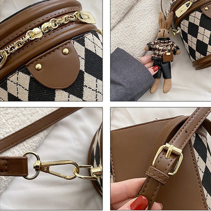 Charlotte - Rundformet håndveske med avtakbar stropp og kanin sjarm