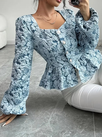 Stella - Elegant bluse med blomstermønster og puffede ermer
