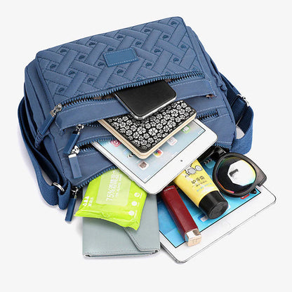 Abigail - Funksjonell og luksuriøs skulderveske med lett tilgjengelige rom