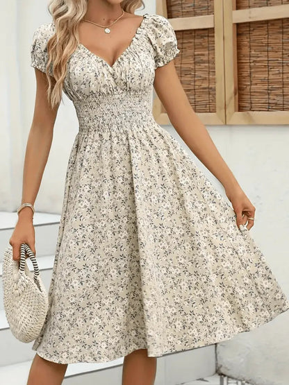 Ella - Blomstret maxikjole med smocked midje og puffermer