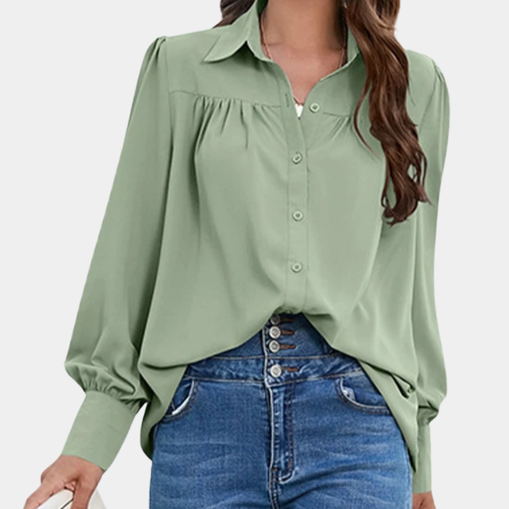 Hazel – Klassisk bluse med knepping med ballongermer og plissert front