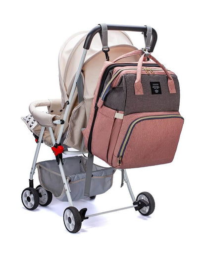 BabyNest - multifunksjonell reiseveske med bærbar stelleplass