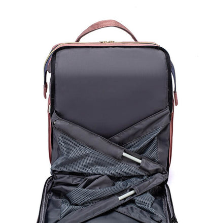 BabyNest - multifunksjonell reiseveske med bærbar stelleplass