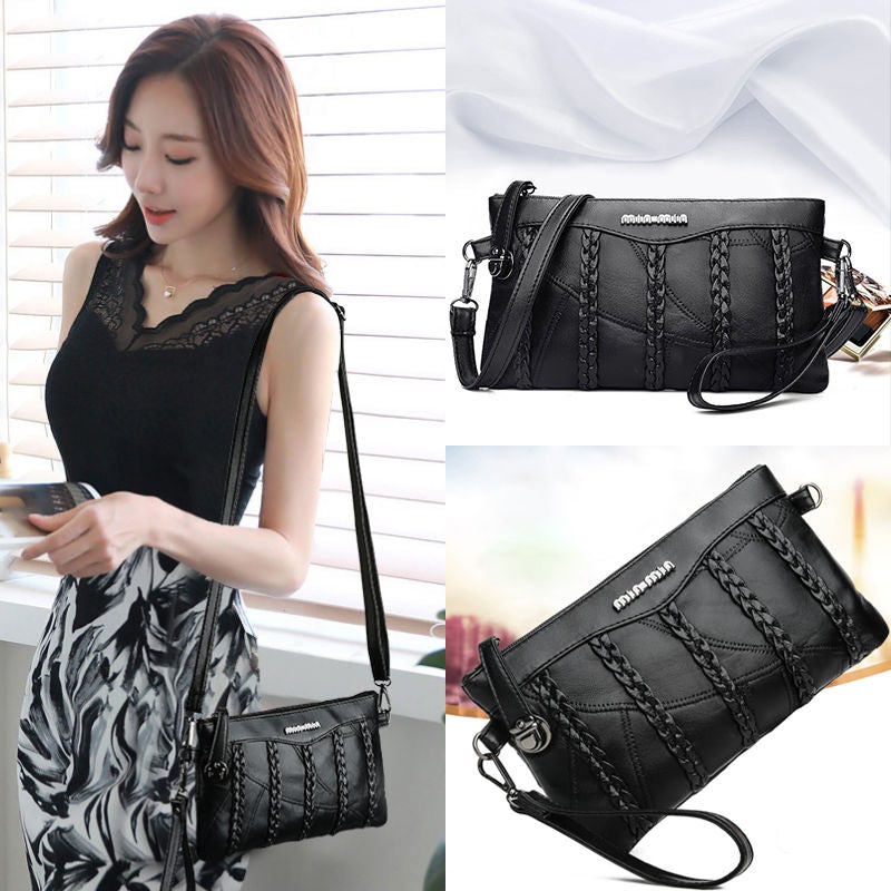 Nora - Sleek crossbody veske med justerbar stropp og flettede aksenter