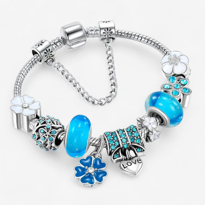 Benthe – Blomsterkjede-armbånd med Blå Krystallperler