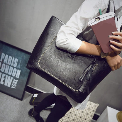 Sophie - Stilig skulderveske med flettede håndtak