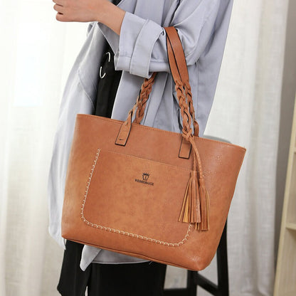 Sophie - Stilig skulderveske med flettede håndtak