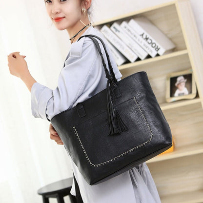 Sophie - Stilig skulderveske med flettede håndtak