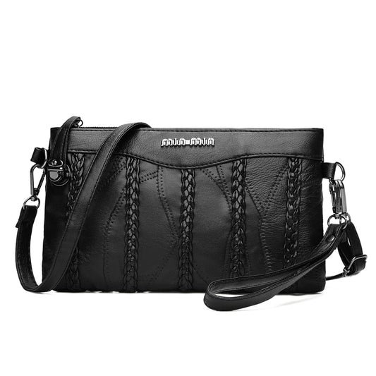 Nora - Sleek crossbody veske med justerbar stropp og flettede aksenter