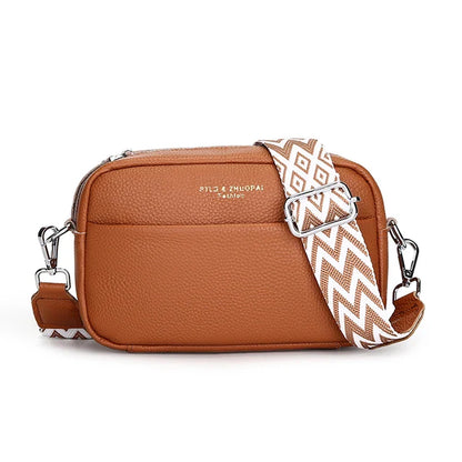 Maya - Kompakt crossbody-veske med justerbar stripete stropp