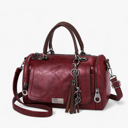 Juliana - søt og funksjonell crossbody-veske med duskdetaljer