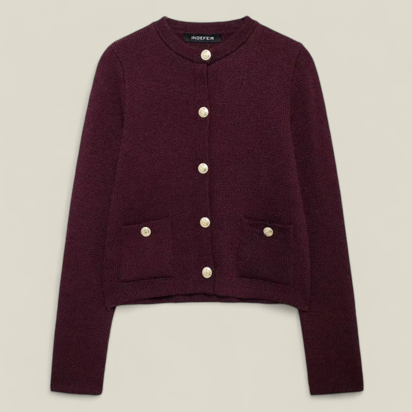Emma - Vintage cardigan med rund hals, smal passform og sofistikerte knappedetaljer