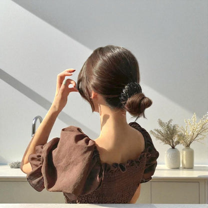 Isabella – Uttrekkbar fuglereir hårklype for enkel styling