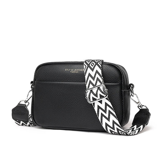 Maya - Kompakt crossbody-veske med justerbar stripete stropp