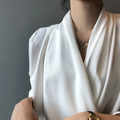 Aurelia - Bluse med drapert utringning for en sofistikert look