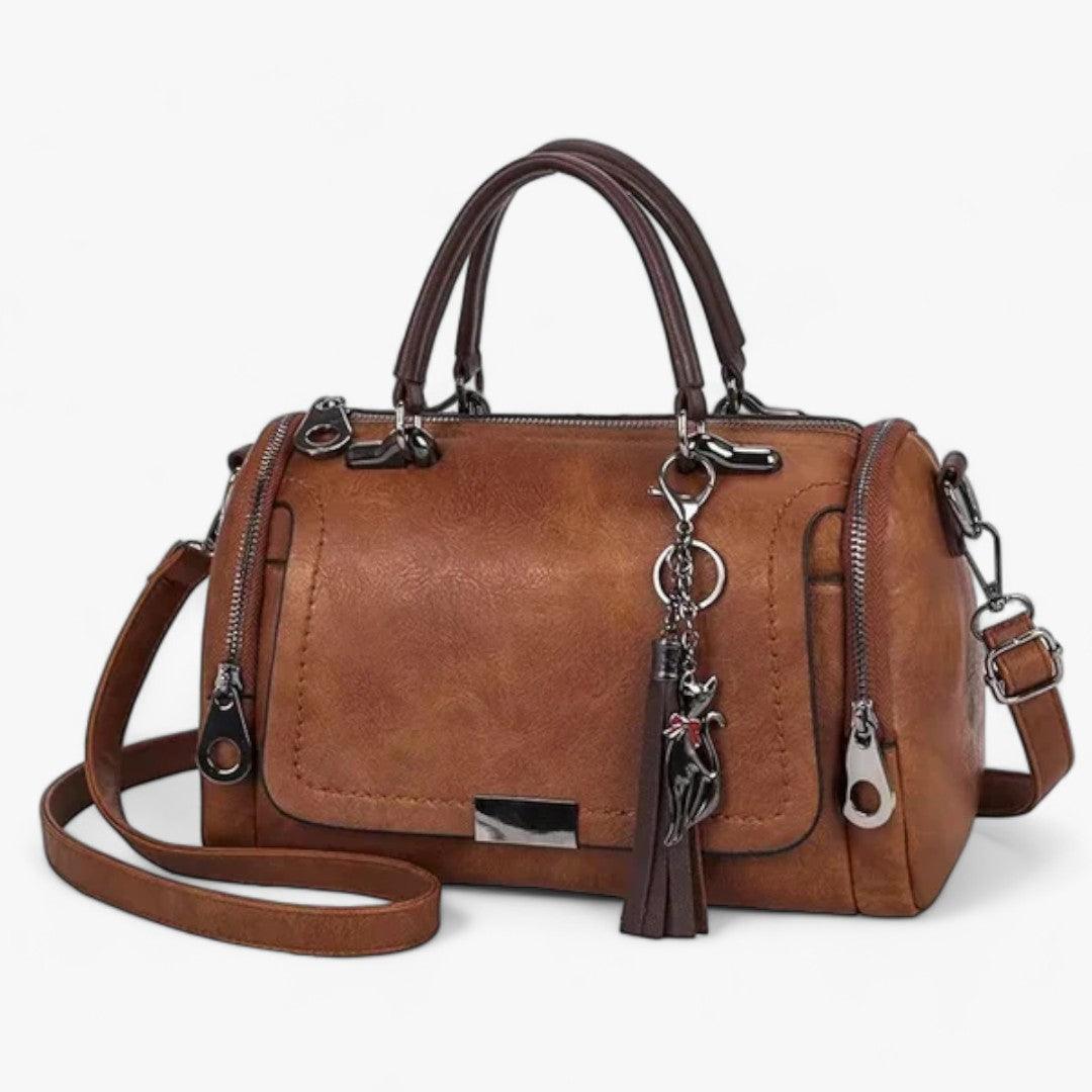 Juliana - søt og funksjonell crossbody-veske med duskdetaljer