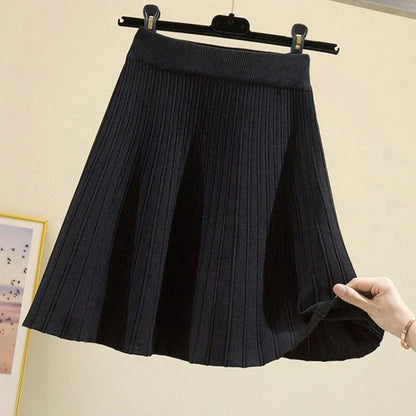 Charlotte - Plissert miniskjørt med høy midje med vertikale linjer og utsvingt fasong