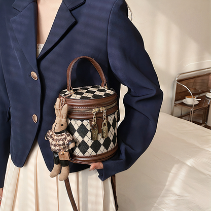 Charlotte - Rundformet håndveske med avtakbar stropp og kanin sjarm