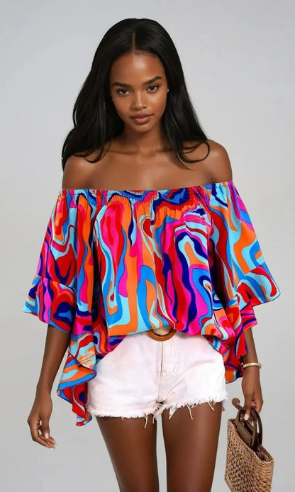 Hannah - Av skuldrene bluse med dristig abstrakt trykk og flytende ermer