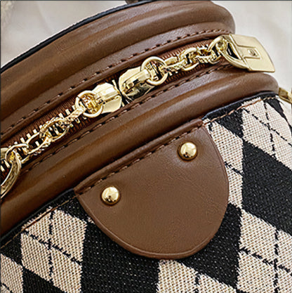 Charlotte - Rundformet håndveske med avtakbar stropp og kanin sjarm